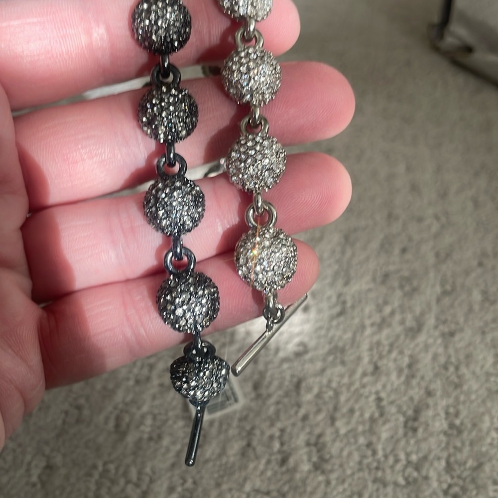 Set of two black and silver Ann Taylor Loft rhinestone toggle bracelets.